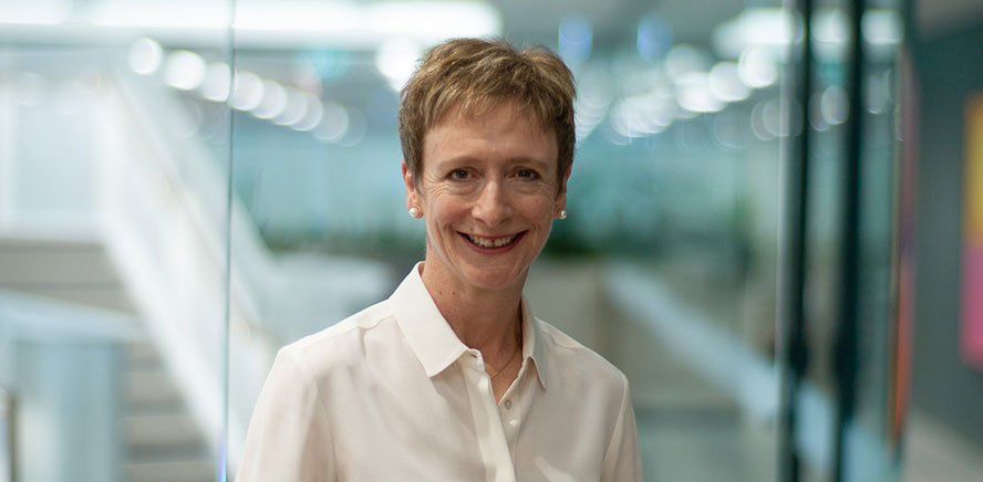 null Head shot of Anne Flanagan, Director and Chair of Vanguard Super's Audit Committee, wearing a white shirt smiling at the camera.